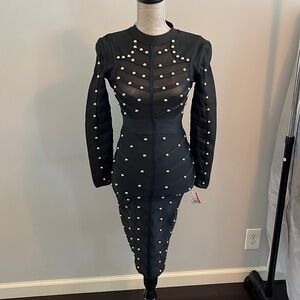 He go black bandaid dress size small. Gold studs though out. Sheer upper.